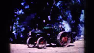 Iowa USA (1959): Old Tractor Plowing Through A Field