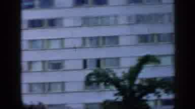 VENEZUELA-1959: Modern White Building With Pink Flowers And Tiered Balconies