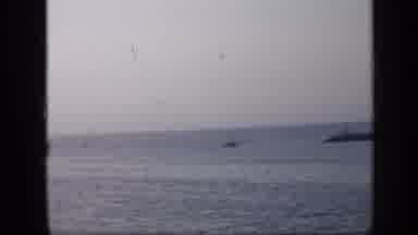 Venezuela (1959): Scene Of The Ocean On A Cloudy Day Then A Scene Of The Sun