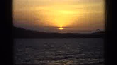 Venezuela (1959): Sunset In The Distance Hiding Behind Clouds With Mountains And