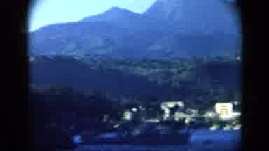 Venezuela (1959): Mountains And Town Are Panned Then Large Boat Moves By In Harbor