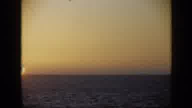 Venezuela (1959): Golden Sun Setting Behind Ocean On A Clear Twilight Evening