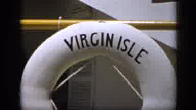 Venezuela (1959): A Round Rescue Buoy Hangs From A Rail Bearing The Wordsâ Virgin
