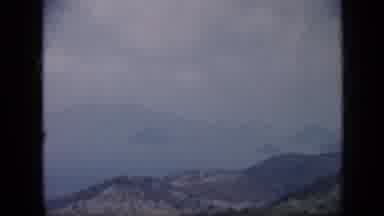 Venezuela (1959): Mountains Covered With Trees And Brush Overlook An Ocean Inlet