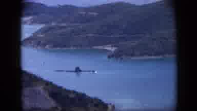 Venezuela (1959): Elevated Panning Shot Of An Island Landscape With Lake And Boat