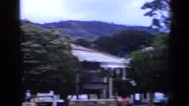 Venezuela (1959): View Of Green Trees And White Buildings On A Clear Day