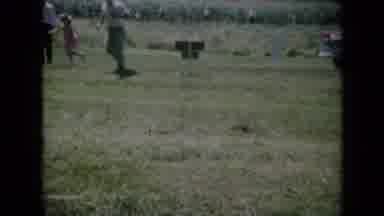 Missouri USA (1961): A Video Of Kids Running And Several Cars Parked In A Grassy