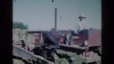 Missouri USA (1961): Farmer Plowing Field On A Sunny Day