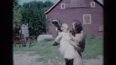 Missouri USA (1961): Mom Holding Up Her Baby Posing For The Camera