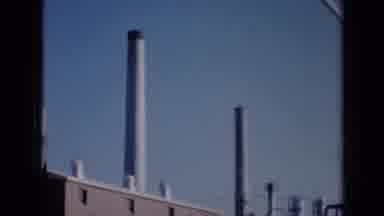 Missouri USA (1961): The Smokestacks On The Building Appear Taller Than The