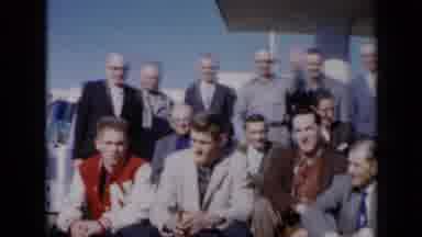 Missouri USA (1961): A Large Group Of Younger And Older Men Are Gathered Outside A