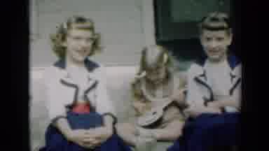 Missouri USA (1961): Girls In Front Of Their House Playing And Smiling On Leisure