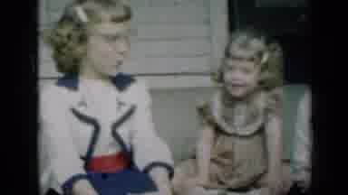 Missouri USA (1961): Kids Sitting On Porch Chatting And Having Fun
