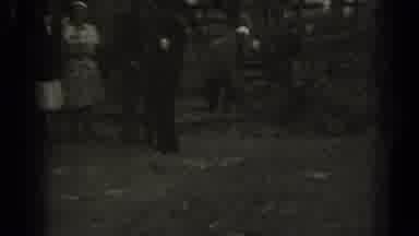 Missouri USA (1961): People Standing And Talking Around An Animal Pen As One Woman