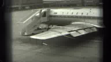 Missouri USA (1961): Big Airplane Parked On A Runway Being Filled With Gas And