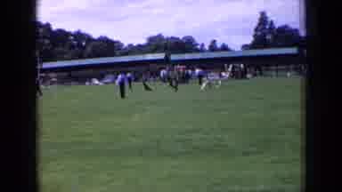 England (1963): Families Gathered School Event Running Freely Happy Outside Green