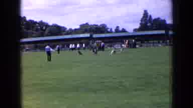 England (1963): Man Signals To Stay To His Black Dog Then Dog Runs Back To Where