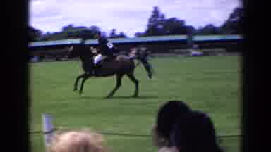England (1963): Single Steeplechase Rider In Outdoor Equestrian Event Spectators