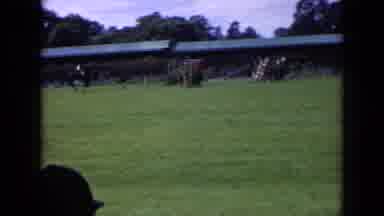 England (1963): A Horse And Rider Jumping Over Obstacles In A Field