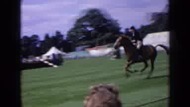 England (1963): Horse Running On Grass In An Obstacle Competition On A Sunny Day