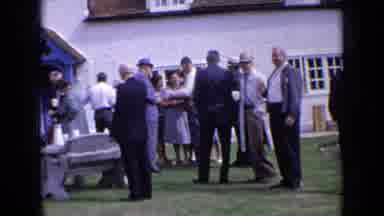 England (1963): Crowd Of Dressed-Up People Waiting Outside Of A Church Some With