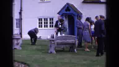 England (1963): Group Of People Next To A Priest Profess Their Faith In A Day Of