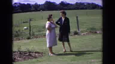 England (1963): Two Women Discuss Something And One Demonstrates With Her Hands As