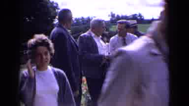 England (1963): Women Walked In The Garden In The Garden With Oranges Roses Next