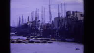 England (1963): Riverside View Of An Industrial Part Of City While Boat Travels