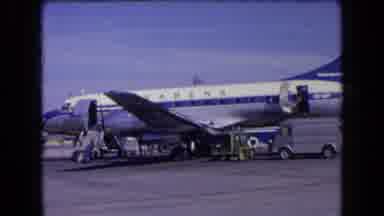 France (1963): Airplane Parked On A Runway Being Maintained