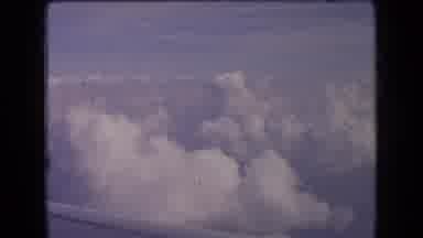 France (1963): Plane Flying Over The Clouds Before Landing At A Nearby Airport