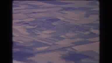 France (1963): Aerial View Of Green And Brown Farmlands On A Clear Sunny Day