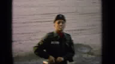 Germany Military Base-1963: Army Guy In Uniform Smoking A Cigarette Then Waving At Camera