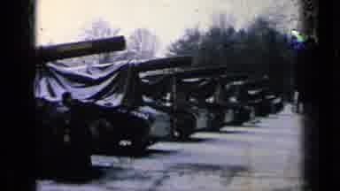 Germany Military Base (1963): Men Check On The Tanks That Are Covered By Large