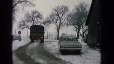 Germany Military Base (1963): A Bus In The Middle Of A Snowy Street Signals Right