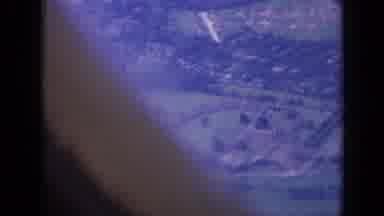 London England (1963): Aerial View Of A Green City With Many Trees And Few Houses