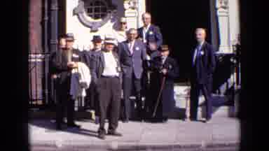 London England-1963: Men In Suits And Hats Posing On Sidewalk