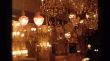 London England (1963): A Man In A Suit In A Room With Lots Of Chandeliers And