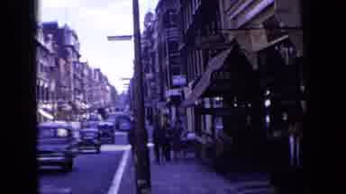 London England (1963): Left Side Of Street With Moving Cars Then Right Side With