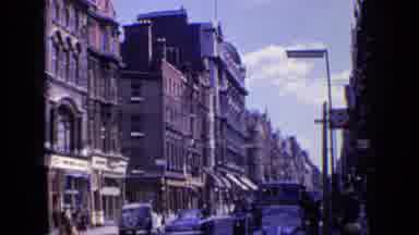 London England (1963): Sweeping View Of A Busy City Street On A Sunny Day
