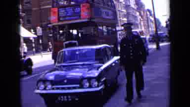 London England (1963): View Of Red Double Decker Bus And People Feeding Birds At