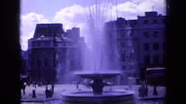 London England (1963): View Of Large Stone Water Fountain On A Bright Sunny Day