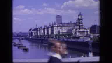 London England (1963): Young Boy Walking Over A Bridge Showing Boats On River