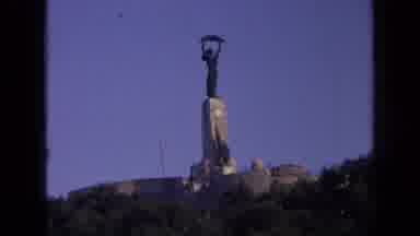 Russia (1963): Low Angle View Of A Tall Metal And A One Statue That Sits On A