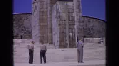 Russia (1963): Three Men Stand Near Edifice Then Many Men In Uniform Stand At