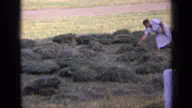 Russia (1963): Tumble Weeds In A Yard With A Woman Moving Them