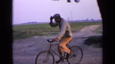 Russia (1963): Man Riding A Bicycle