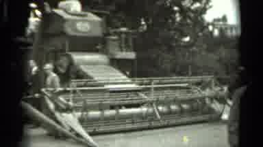 Russia (1963): Men Next To A Harvester That Will Be Taken To A Farm With Large