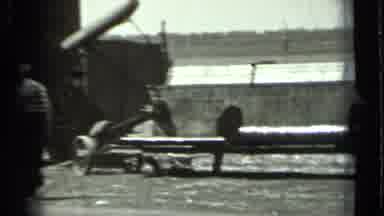 Russia (1963): Farming Men Doing Maintenance On Farm Machinery That Has Broken