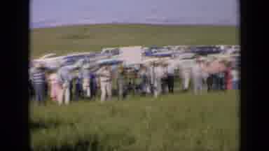 Kansas USA (1964): People Park In The Field Then Gather Around The Fence Together